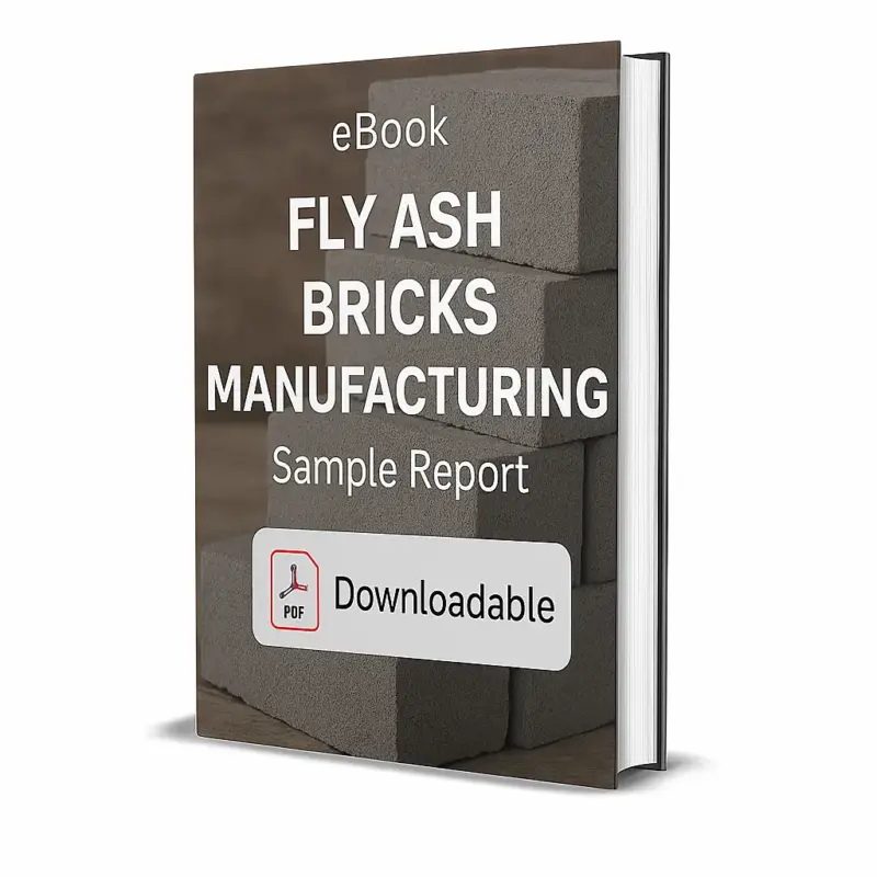 3D-rendered eBook cover for "Fly Ash Bricks Manufacturing Sample Report." The cover features a stack of gray fly ash bricks arranged on a wooden surface with a blurred industrial-style background. The title text reads “eBook FLY ASH BRICKS MANUFACTURING Sample Report” in bold white font, and a PDF icon with the word “Downloadable” is displayed at the bottom.