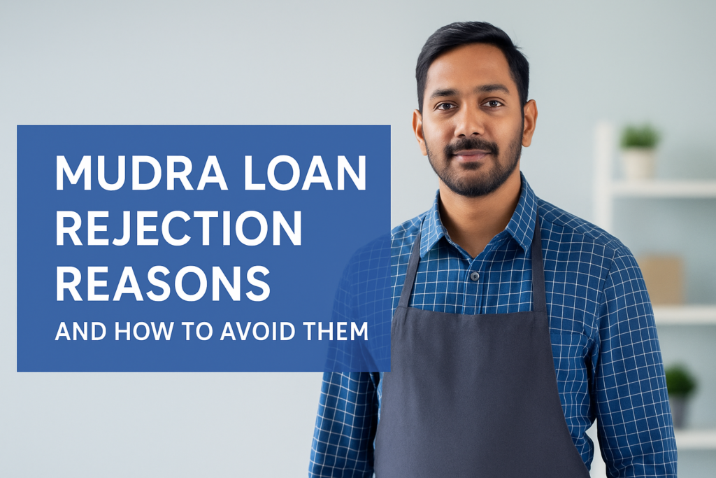 Indian entrepreneur in blue checkered shirt with apron, standing beside a centered blue text box reading “Mudra Loan Rejection Reasons and How to Avoid Them” in bold Montserrat font, against a clean, softly-lit office background.