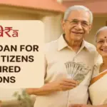 An elderly Indian couple stands smiling in front of their home. The man, dressed in a cream shirt, holds a fan of ₹500 notes, while the woman in a traditional cream and gold saree smiles beside him. On the left side of the image, a clean beige overlay features the Mudra logo and the bold text “MUDRA LOAN FOR SENIOR CITIZENS OR RETIRED PERSONS,” designed with ample padding and a professional, trustworthy look.