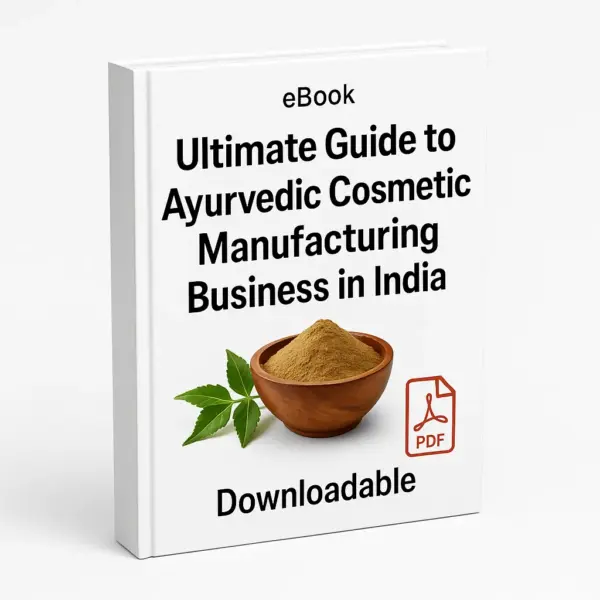 A 3D eBook cover called ‘Ultimate Guide to Ayurvedic Cosmetic Manufacturing Business in India,’ shown on a plain white background. The cover includes Ayurvedic herbs, a red PDF icon, the word Downloadable, and the book shown slightly from the right side so the spine is visible.