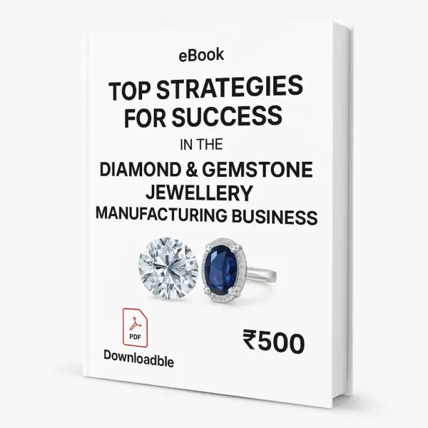3D eBook cover titled ‘Top Strategies for Success in the Diamond & Gemstone Jewellery Manufacturing Business,’ displayed on a clean white background with bold black title text, a diamond and sapphire ring image at the center, a small ‘eBook’ label at the top, a red PDF icon with the word ‘Downloadable’ at the bottom left, visible right-side spine, realistic lighting, and the printed price ₹500